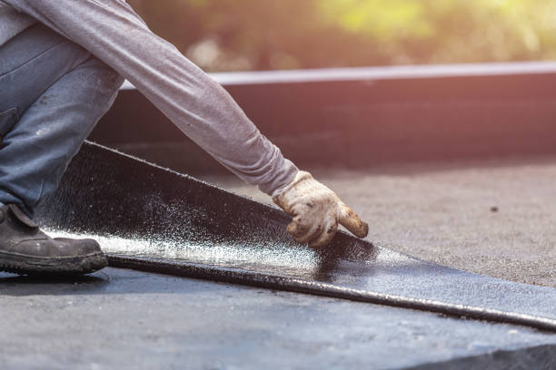 Professional Basement Waterproofing technician working in Bellevue, MI